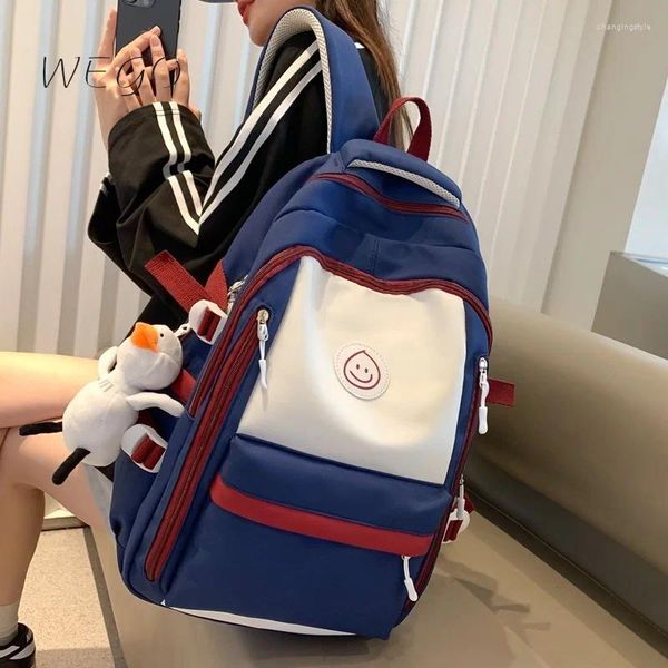 Mochila vendiendo lienzo 2024 estudiante de moda paquete de atrás japonesa minimalista de la escuela secundaria bolsas de viaje de viaje