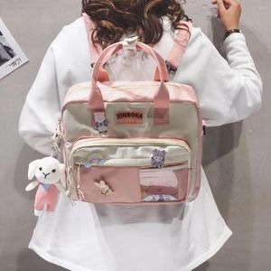 Sac à dos de style sac à dos en nylon kawaii sac à dos pour femmes mignonnes badges scolaires de mode sac à bandoulière 2024