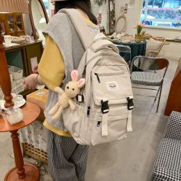 Sacs à dos 2022 Nouveaux femmes imperméables en nylon nylon sac à dos coréen japonais étudiants d'étudiants scolaires multicouches Send de voyage simple sens