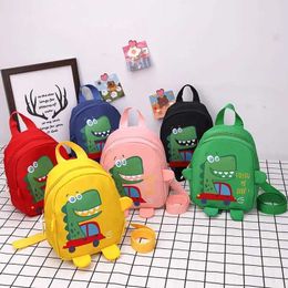 Rugzakken schattige dinosaurus kleuterschool backpack cartoon outdoor baby verlies preventie verstelbare kinderen schoudertas voor meisjes en boyl240502