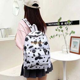 Rugzakken gepersonaliseerde Harajuku -stijl dames rugzak ins super hot cow patroon schattig meisje canvas tas soft girl backpackl2405