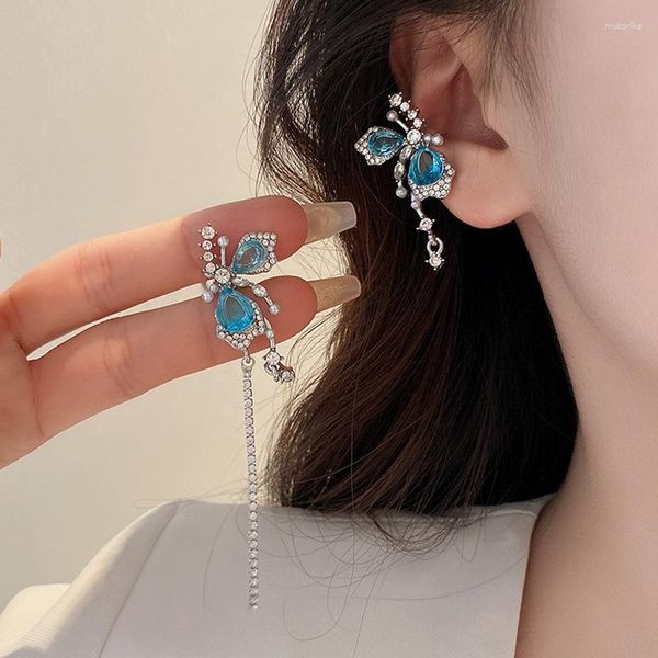 Pendientes traseros S925 Aguja de plata Corea del Sur Mariposa azul simple Asimétrica Chica dulce Clip de hueso del oído de gama alta junior sin agujero