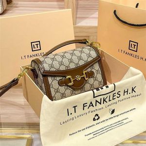 Sac 22% de réduction Sac à main de créateur Agent d'achat de Hong Kong Zhao Lusi, le même nouveau téléphone de selle en cuir à la mode, petit sac à bandoulière polyvalent