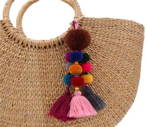 sac de sac clés de pavage à paquets Pompom Course avec charmes miroir pour les femmes sac tendance suspendus bijoux coloré5323257