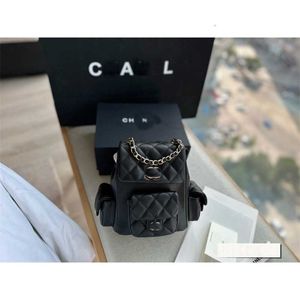 Tasontwerper handtas cowhide mode backpack flip met schouderdiamant damesketen mobiele make -up mini telefoon 2024