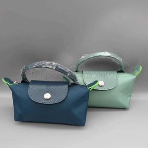 Tasontwerper Hoge-versie kaarthouder en koeienhuid Hoogwaardige deksel Handtas Opruiming Groothandel Femme Mini Women Handtassen Dumplings Beach Tags