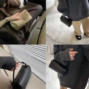 Tasontwerper mini de kussenrij premium emmer handheld tassen handtas eenvoudige suede dames pen