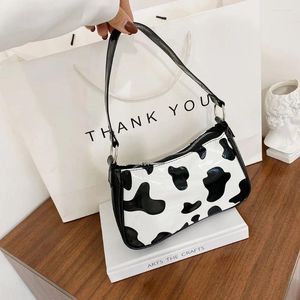 Bolsas de moda estampada de vaca animal mujeres retro pu cuero de cuero casual de viaje en la parte superior del hombro de la altura de la altura