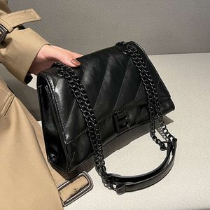 Sac pour femme en automne et en hiver, nouveau sablier avec un sentiment de luxe, niche, chaîne à bandoulière, tendance des sacs sous les bras 2024