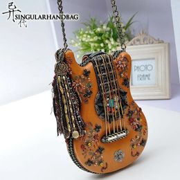 Bolsa Modelado de guitarra femenina hecha a mano 2024 Cadena de cuentas de ocio retro pequeños hombros solteros de hombro inclinado