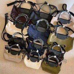 BAG HOGE KWALITEIT FACTORY -winkels zijn 95% korting op de goedkeuring Verkoopbescherming Dumpling Handheld Milieureeks Nylon Weefriem Schouder Single Crossbody