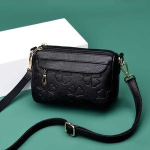 Tas kleine dames 2024 Koreaanse mode van middelbare leeftijd moeders multi -gelaagde zacht lederen single schouder crossbody voor vrouwen