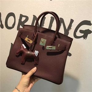 Sac fourre-tout Fashion Fashion Platinum Litchi Grain Top Top Coue Coue Cuir portable Messenger