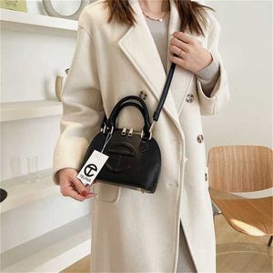 Sac femme sac nouveau sac de poche femme une épaule sac à bandoulière sacs de bonbons sac coquille 60% vente de sortie d'usine RXJ0