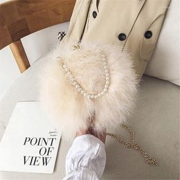 Bolsas de embrague para mujeres Feather Diseñador de lujo Handbag Cadena de perlas Partido de boda Messenger de luxe femme sólido Z074