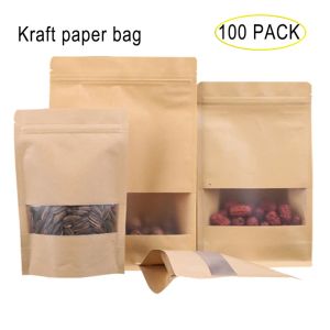 Sacs 100 PCS / Lot Stand Up Kraft Paper Sachets avec Windows Snack Food Sacs Ziplock Sacs Sacages d'emballage alimentaire scellé avec encoche