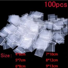 Sacs 100pcs mini sac d'emballage en plastique petit sac à fermeture éclair en plastique bijoux bijoux / sac de rangement alimentaire sac de cuisine sac de cuisine