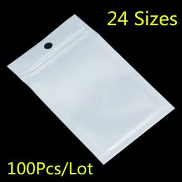 Sacs 100pcs petits sacs d'emballage en plastique de verrouillage à fermeture éclair blanc / transparent avec zipper auto-scellé transparent ziplock poly sac d'emballage hang