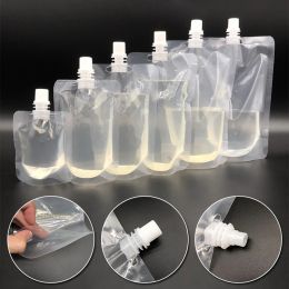 Sacs 10pcs 100500 ml Plastique Stand Up Brink Drink Sac de buse transparente Voyage extérieur Camping Liquide Juice Milk Scellant Sacs de rangement