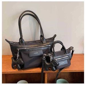 Tassen 2022 Autumn en Winter Nieuwe Black Knight Dumpling Bag Vrouw Summer Cool Sa Minderheid Draagbare Sling Single Shoulder Cross Cars Portemonnees