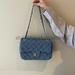 Bolsas 2023 no início do outono nova corrente Xiaozhong Lingge jeans azul bordado vagando ombro único oblíqua Straddle bolsas femininas elegantesbolsas de mãoloja