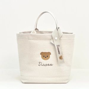 Sacs Ins Cartoon Bear Mom Sac pour bébé couches en toile extérieure Sac en toile de maternité Nappy Packs de travail de travail de travail