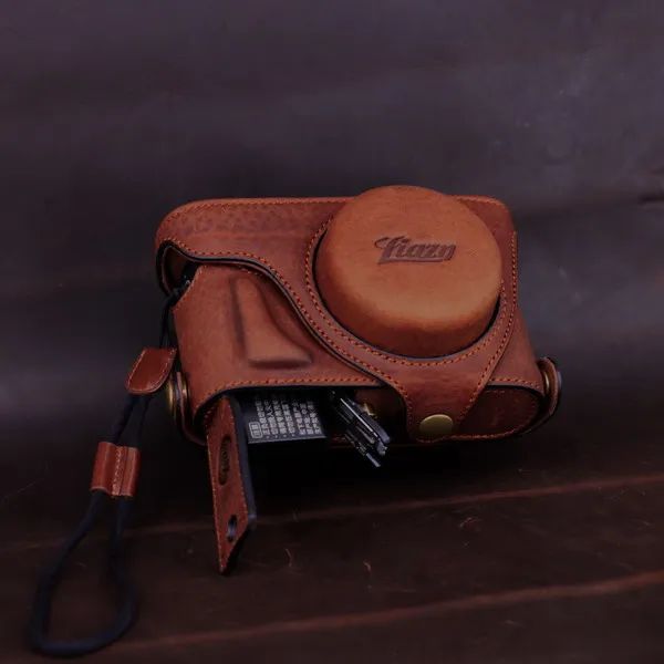 Sacs en cuir photo caméra boîtier de carrosserie Boîte de sacs de sac de couverture inférieure pour Leica X2 X1 XE XE TYP102 Batterie ouverte Conception de la conception du manchon de protection