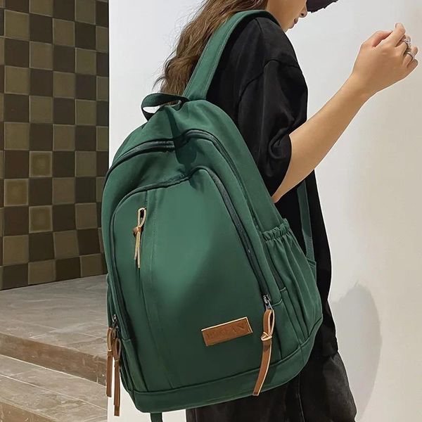 Sacs Men Femme Book Nylon Bag Fashion Mâle Femmes Homme College Backpack Nouveau garçon Girl School Sac Lady Laptop Travel Étudiant Backpack Trendy