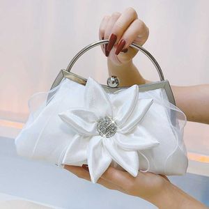 Sacs Mesh National Wind Flower Fleur Handheld Banquet Banquet Qipao Bags de luxe Bagous