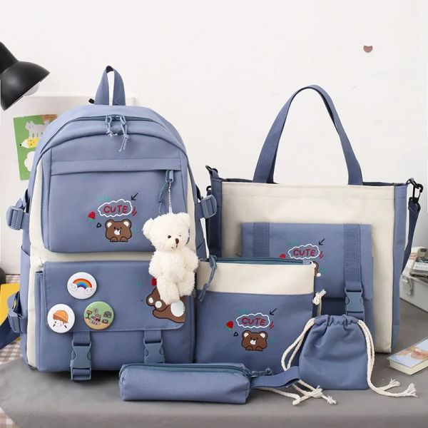 Bolsas nuevas 5 pcs colocaciones de mujeres bolsas de secundaria nylon kawaii mujeres mochila mochila bolsas de moda femenina con lujoso colgante lindo