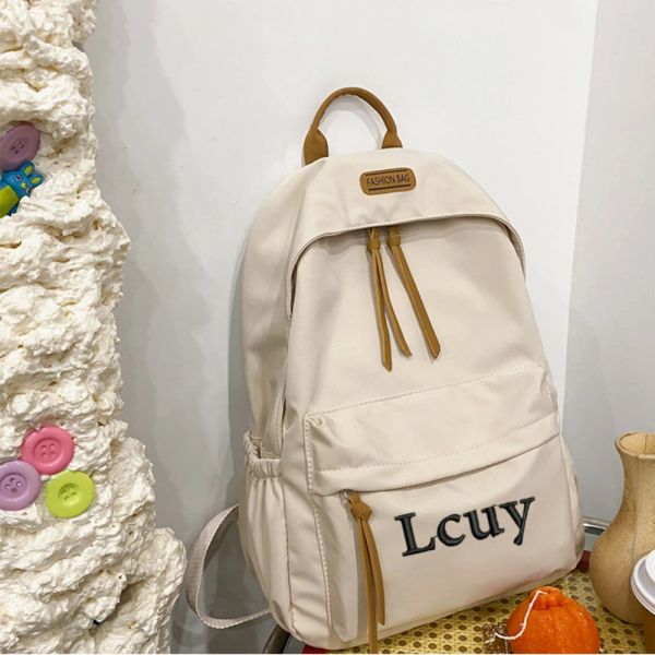 Bolsos Nuevo Nombre personalizado Mochila escolar Bordada su nombre Mochila para estudiantes de secundaria Mochila de gran capacidad para niños y niñas Mochila para estudiantes