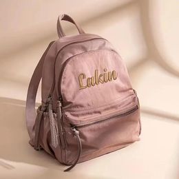 Bolsos Bolso de mochila de moda mini bordado personalizado, bolso escolar de muy buen gusto de nailon Nombre personalizado Mochila de viaje de moda para mujer Mochila