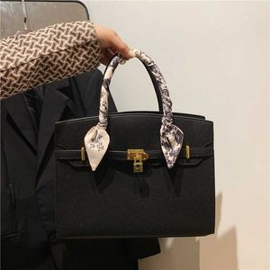 Sacs magasin sortie nouvelle couleur unie femmes léger luxe foulard en soie sac à main Simple nœud papillon bandoulière fronde une épaule sac