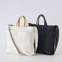 Sacs Tilorraine 2022 Sac en toile simple japonais Nouveau sac de messager pour femmes Solide à épaule douce et à grande capacité