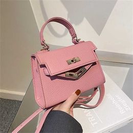 Bolso de mujer 2022 nueva textura color sólido mini pequeño sling un hombro portátil mensajero mujer monedero