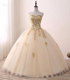 Robe de bal princesse champagne robes de mariée en or appliques perles en dentelle en tulle