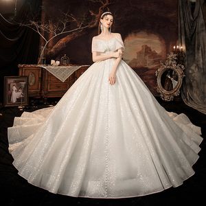 Robes de mariée robe de bal 2024 Bling Off Bling épaule Sequins Appliques perles volants brillants robes de mariée formelles Lace Up plus