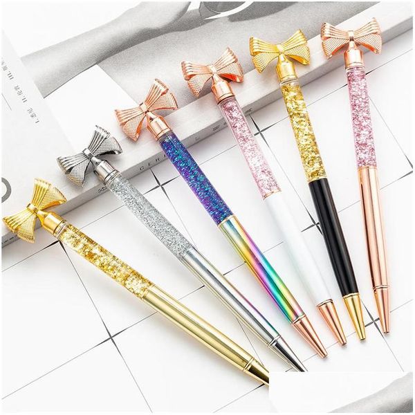 Stylos à bille Vente en gros de mode Poudre d'or Arc Stylo en métal Papeterie Nouveauté pour l'écriture Papillon Publicité Bureau Drop Delivery Dhnug