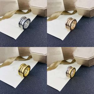 Band anneau blanc Black Pottery Sier Gold Groove Design anneaux pour femmes bijoux d'anniversaire cadeau en acier inoxydable S