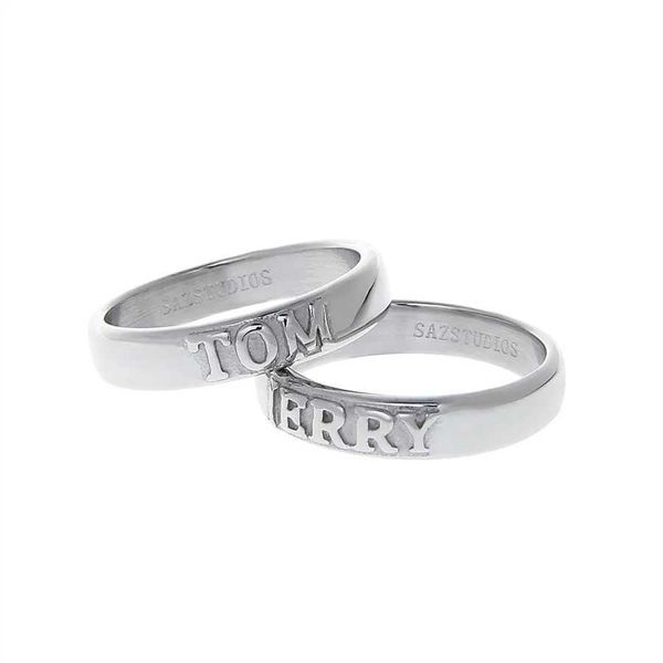 Bands Anneaux 2023SS Lettre originale Gravure Paire de paires anneau de haut niveau en acier en acier titane Couple Plain Couple Mens and Womens Bijoux J240506