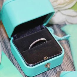 Band anneaux Classic Trendy Luxurys Designer Jewlery for Women Sense Sense Sterling Sier Ring Ladies Six-Claw Diamond Birthday Drop Del Otdks