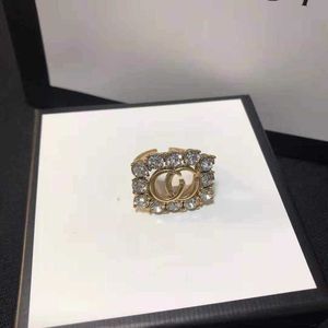 Anneaux de bande designer Brass Flap Ring Sparkling Diamond Black Medieval Strap Tidal Femme QVM6