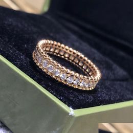 Bands anneaux Designer pour femmes Luxury Fashion Classic Jewelry Diamond Ring 18K SIER PLATED MEDIAL ROSE ROSE GOLD ENGAGEMENT COUPLE DR DHAB9