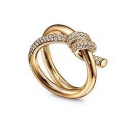 Anillos de banda anillo de diseñador damas anillo de nudo de cuerda lujo con diamantes anillos de moda para mujeres joyas clásicas de oro de 18 km bordes de oro al por mayor