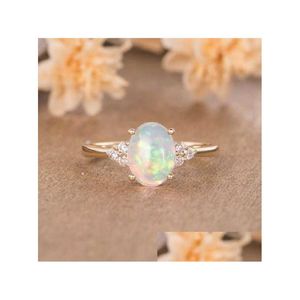 Anillos de banda Exquisito Opal de moda para mujeres Grupo de corte ovalado de octubre de octubre de la mitad de la eternidad de la fiesta de bodas Joyas de regalo Dhrxz