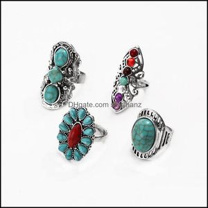 Band ringen sieraden S2250 mode etnische stijl ring retro turquoise gesneden uitgeholde bloem set 4pcs / set drop levering 2021 xp0wq