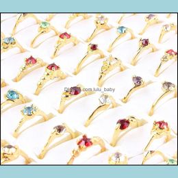 Anillos de banda Joyas Venta al por mayor Lotes 50 Unids Crystal Rhinestone Color oro Mujeres Anillo Compromiso Boda Fiesta Regalo Moda D Dhtr0