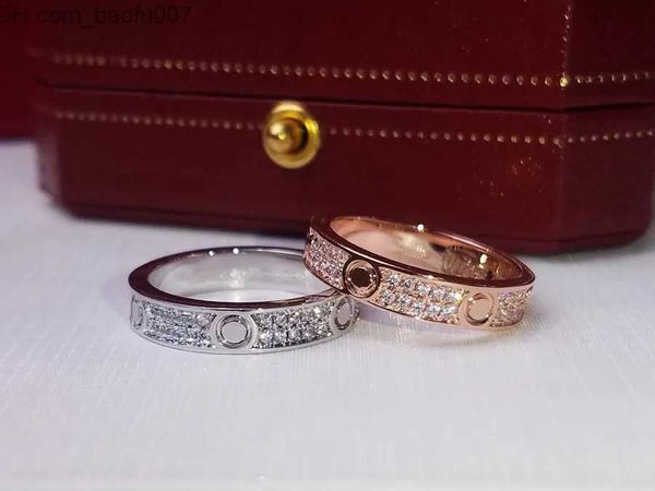 Les créateurs de luxe de Band Rings couplent une bague avec un côté et un diamant de l'autre côtéDes produits exquis font des cadeaux polyvalents bien agréable Z230629