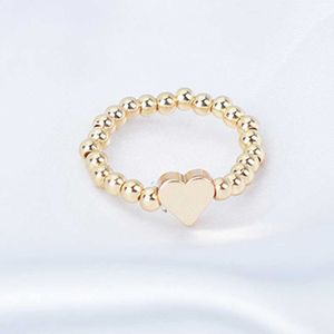 Anillos de banda, nuevos anillos coreanos de corazón con cuentas de Color dorado para mujer, anillo elástico hecho a mano, joyería ajustable Simple, regalo de fiesta de boda