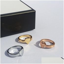 Bands anneaux New Love Heart Designer Design Titanium Ring Jewelry Classic Men and Women Couple Style Modern For Girl Cadeaux Drop Livrot OTS24